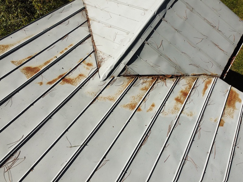 Discolored metal roof